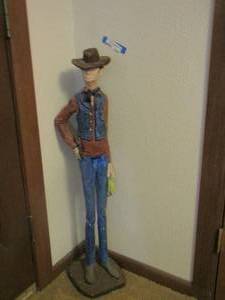 lot 1064 image: tall corner statue of a man  38