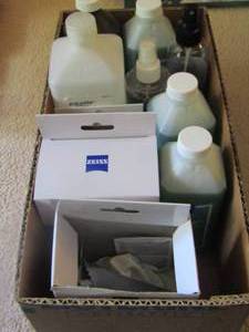 lot 1105 image: new and used bottles of alcohol and peroxide, eye glass cleaner