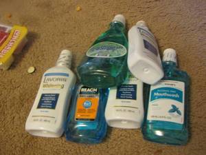 lot 1115 image: bran new bottles of mouth wash never opened