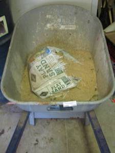 lot 1189 image: wheel barrow with play Sand in it