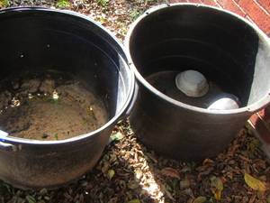 lot 1223 image: 2 large black outdoor planters