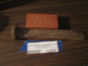 lot 1406 image: SMALL ACME BRICK & RAILROAD  SPIKE