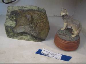 lot 1342 image: wolf etched on a rock, small wolf dcor