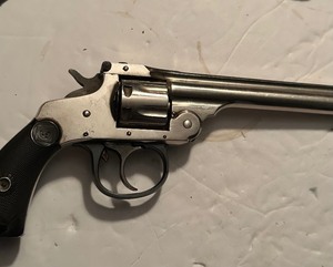 lot 2004 image: Harrington and Richardson Arms co., Top break 22 Revolver 7 shot #577 in holster
