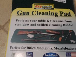 lot 1037 image: GUN CLEANING PADS .