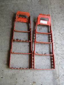 lot 1957 image: folding steel traction aids