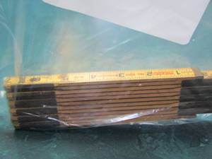 lot 1646 image: foldable measuring stick