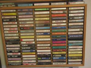 lot 1041 image: various CASSETTE TAPES  and wall shelf