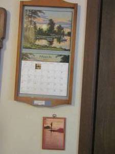 lot 1044 image: calender wall holder and small wall art