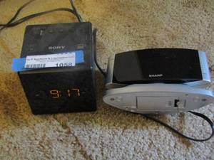 lot 1058 image: sony alarm clock, sharp alarm clock