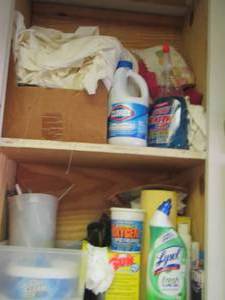lot 1455 image: towels and cleaning chemicals