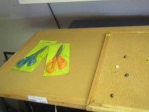 lot 1459 image: 2 pair of scissors, with 2 peg boards