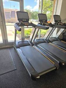 lot 1 image: Barely Used & Like New Matrix T7XE Treadmill w 16 Touchscreen XER Console & Multimedia Console