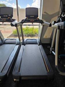 lot 9 image: Barely Used & Like New Matrix T7XE Treadmill w 16 Touchscreen XER Console & Multimedia Console