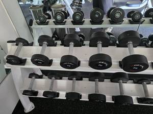 lot 77 image: Set of 5 Denali USA Pro Style Urethane Dumbbells.  Includes 1 of Each Dumbbell 5lb, 10lb, 15lb, 20lb & 25lb