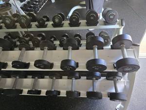 lot 78 image: Set of 5 Denali USA Pro Style Urethane Dumbbells.  Includes 1 of Each Dumbbell 5lb, 10lb, 15lb, 20lb & 25lb