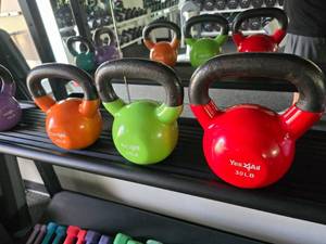 lot 90 image: Lot of 3 Yes 4 All Coated Kettle Bells.  Includes 20lb, 25lb & 30lb