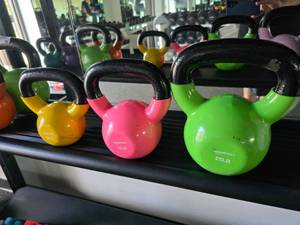 lot 91 image: Lot of 3 Coated Kettlebells.  Includes 10lb, 15lb & 25lb