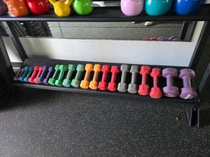 lot 93 image: Lot of 11 Pairs of Coated Dumbbell.  Includes 1lb, 2lb, 3lb, 4lb, 6lb, 7lb, 8lb, 9lb, 10lb, 12lb & 18lb