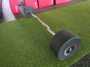 lot 112 image: Denali USA Pro Style Urethane E-Z Curl 100lb Barbell