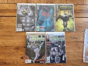 lot 27 image: MAX Comics - Cage #2, 3, Supreme Power Nighthawk #4 of 6, and U.S. War Machine #8, 9