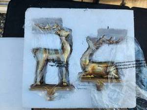 lot 155 image: Set of brass deer stocking holder figurines