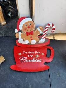 lot 158 image: Glitzhome 30 metal Gingerbread man in coffee mug yard stake