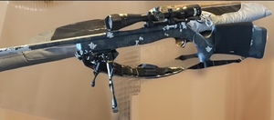 lot 5 image: Winchester .243 Caliber Left Hand Bolt Action Rifle W Digital Camouflage, Scope, Bi-Pod, &amp Soft Case