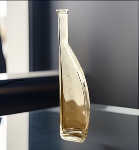 lot 14 image: Antique Banana Type Glass Crystal LiquorWhiskey Clear Decanter Bottle