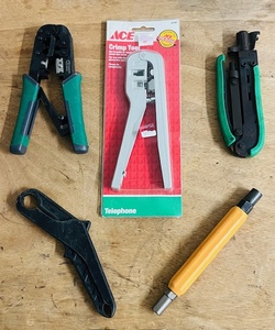 lot 35 image: Five (5) Electrical or Telecommunications Repair Tools - Including&nbspData Shark Greenlee Paladin70020 Dieless Crimper, Harris Dracon 44507 Telecom Corporation Hsnd Tool, New Ace Crimp Tool, and &nbspCommercial Electric Wire Strippers