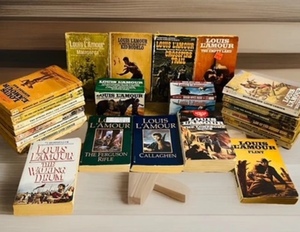 lot 60 image: Huge Lot of Vintage Louis LAmour Paperbacks - From the 50s up