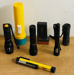 lot 154 image: Seven Flashlights - Including BellHowell, Larry LED Multiple Function Flashlight, &amp Smith &amp Wesson