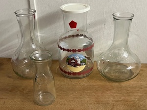 lot 186 image: Four Vintage Wine CarafesPitchers - Including&nbspDolgencorp KIG Indonesia Barnyard Red Glass CarafePitcherJug W Lid EUC &amp Paul Masson Since 1852 Hourglass Shaped Carafe