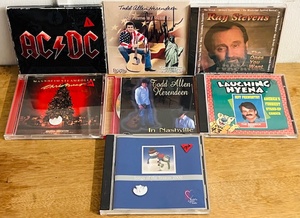 lot 292 image: Seven (7) CDs of the Most Eclectic Combination We have Ever Put Together- From ACDC, to Ray Stevens, to Jeff Foxworthy, to an Autographed Todd Allen Herendeen