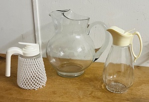lot 273 image: Libbey Hand-Blown Clear Crisa Acapulco Mr. Koolade Pitcher, &amp Two Vintage Syrup Pitchers