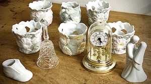 lot 304 image: Six (6) Vintage Robins Egg Blue Daisy Votive Candle Holders, Small Embassy Anniversary Clocking, Vintage Cut Glass Bell, Vintage Porcelain Wedding Cake Topper, & Ceramic Baby Shoe
