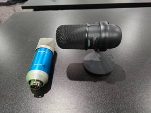 lot 100 image: Lot of 2 Microphones.  Includes Nady SCM-700 & HyperX Solocast Standalone Microphone (Bid is times the quantity of 2)