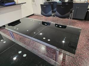 lot 121 image: Copenhagen Extendable Glass Dining Table.  Table Measures 56 x 33 x 30 Unextended (69 x 33 x 30 Exteded)