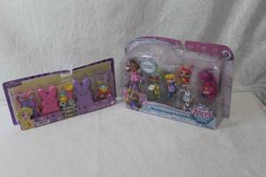 lot 46 image: Polly Pocket peep set Alice and wonderland both unopened