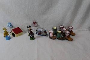 lot 50 image: Ploto and Mickey mouse plant decor and 7 decorative boots