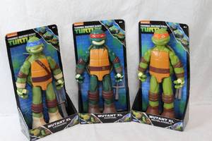 lot 62 image: 3 teenage mutant Ninja turtles unopened
