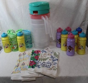 lot 72 image: lot of 3 Pitcher and a large lot of kids cups and some hand towels all unused