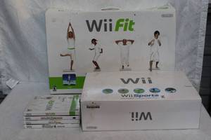lot 44 image: Wii console and Wii fit bord