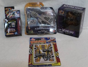 lot 75 image: mixed lot of toys Transformers and Buzz Lightyear and Wednesday itt doll and speed shotz model kit