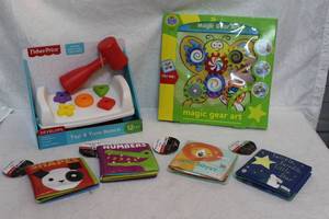 lot 76 image: Fisher-Price Tap and Turn Bench and Magic Gear Art toy and soft books all unopened