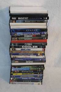lot 204 image: Large lot of DVDs titles like up close and personal, wedding planner,virus,fast food nation, superman 2,night at the museum,avatar and many more