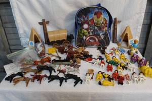 lot 202 image: Mixed lot of toys Western toys and and others see pictures the wagon tires do not snap on one side or just sets on it see pictures