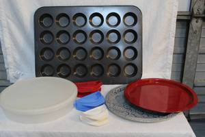 lot 214 image: Muffin pan and plastic food storage container and a set of empanada makers and more see pictures