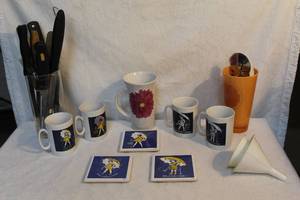 lot 113 image: Mortons salt cups and coasters glass full of kitchen knives and way more see pictures