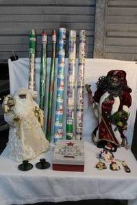 lot 121 image: Mixed lot of Christmas things wrapping paper and two Santa clauses and more see pictures